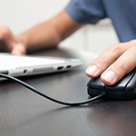 laptop user & mouse